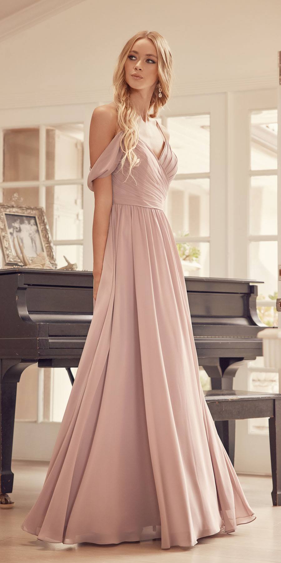 Mauve pleated off-shoulder formal dress with draped straps and flowing skirt