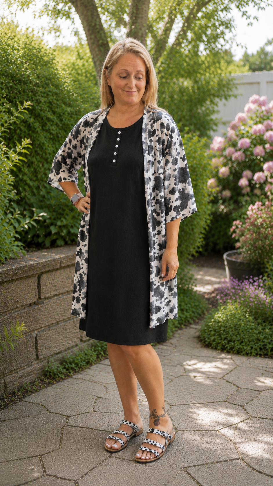 Cow print 3/4 sleeve cardigan with open front and mid-length hem