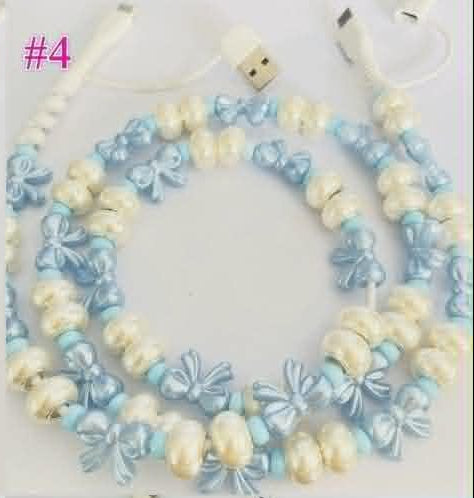 Beaded 4-in-1 charging cable with light blue bow beads and white connectors