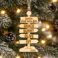 Rustic wooden family Christmas signpost ornament with engraved names and year 2025