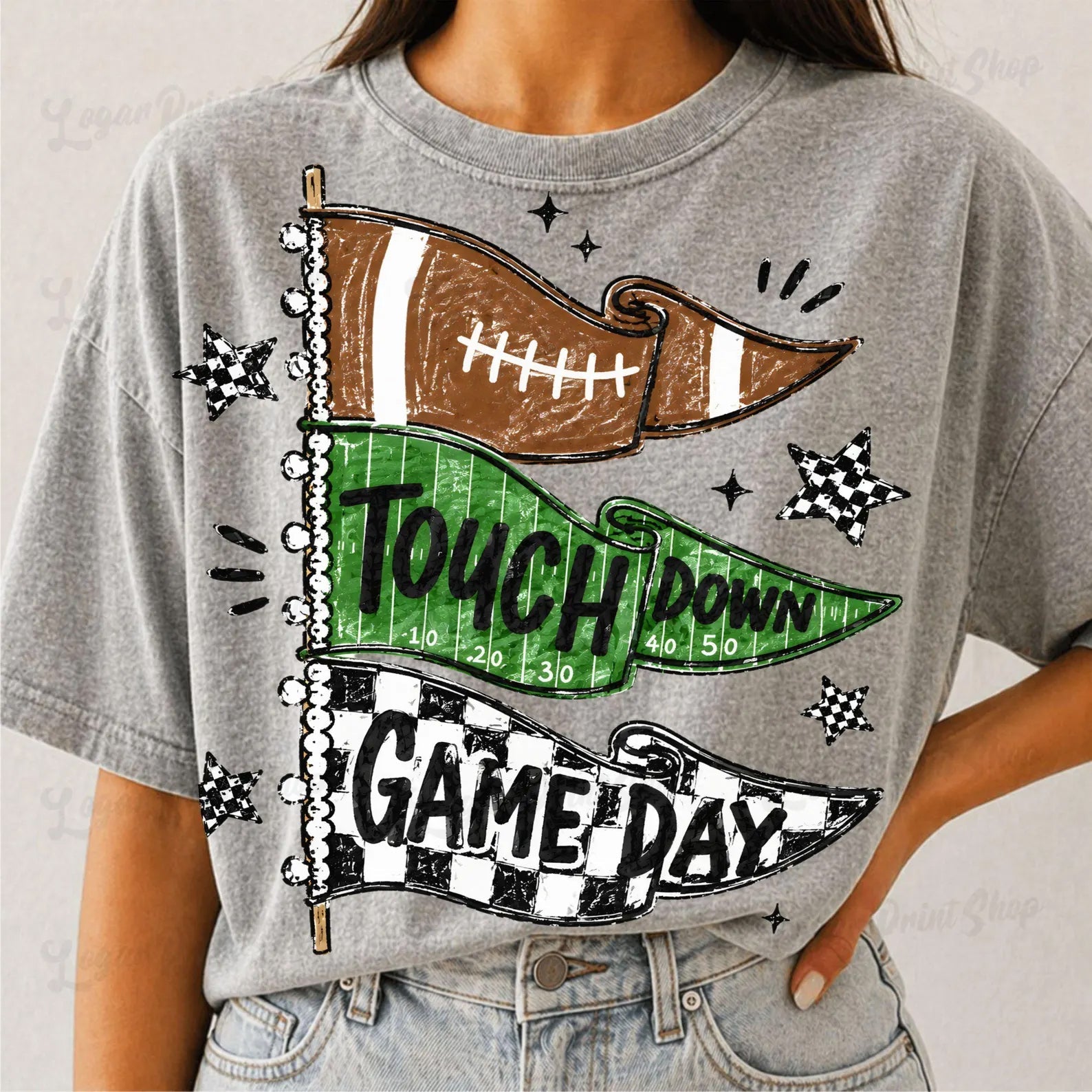 Gray game day graphic tee with brown and green footballs and black text print