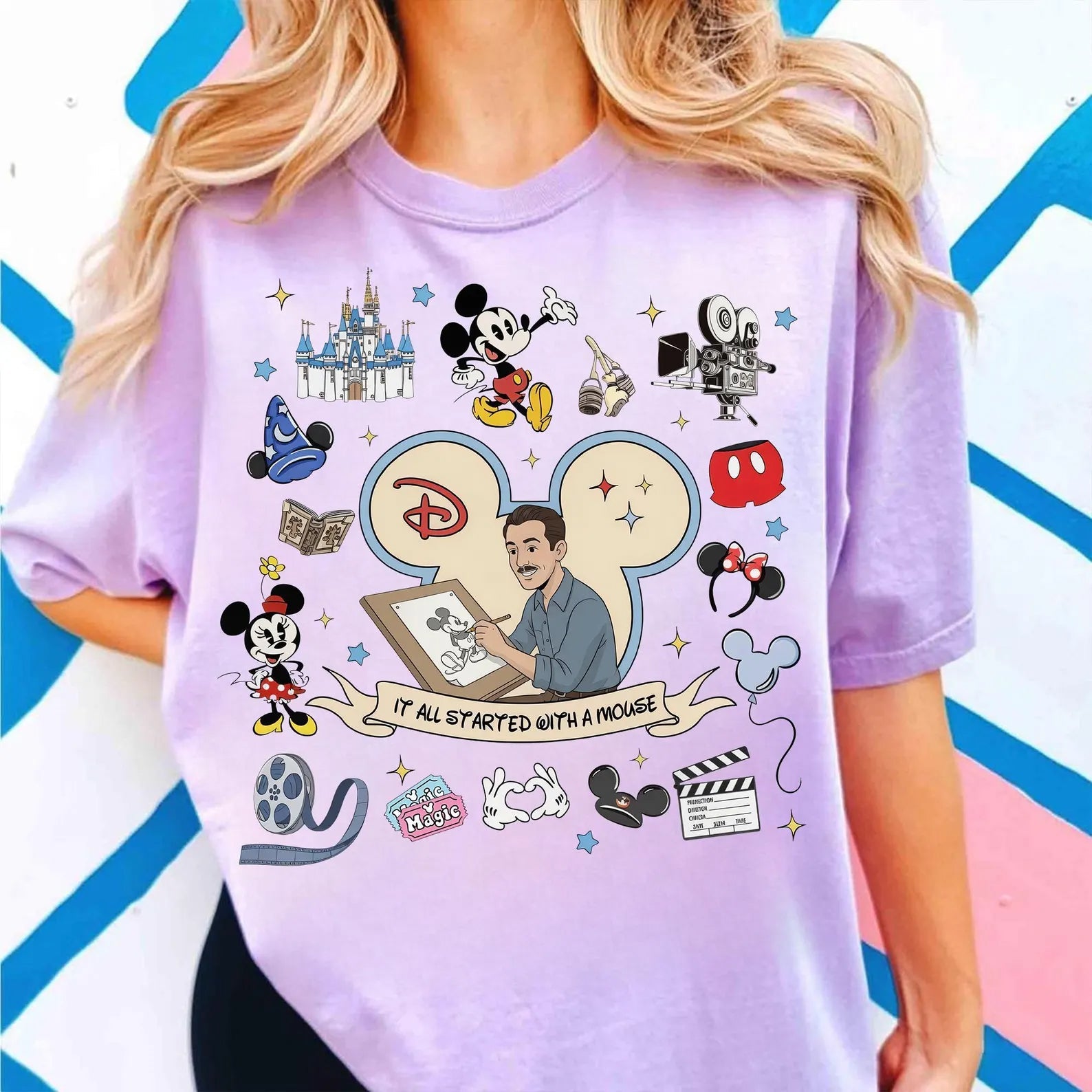Purple graphic tee with large Mickey-style character collage on front