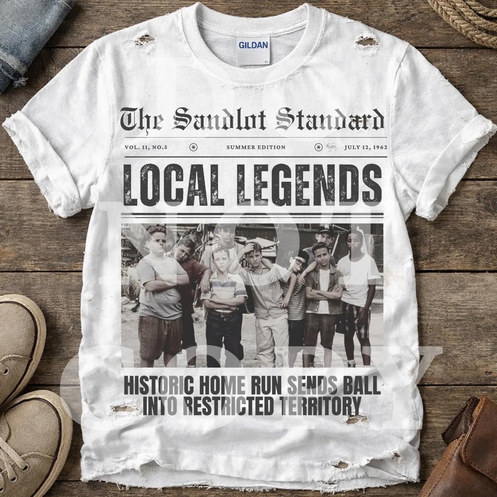 White graphic tee with distressed rips and large 'LOCAL LEGENDS' text and photo print