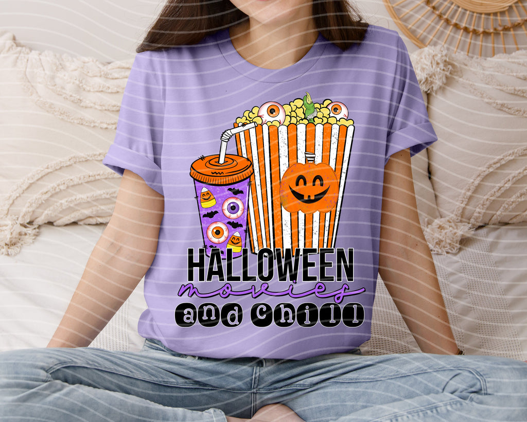 Purple Halloween graphic tee with popcorn, jack-o-lantern, and “Halloween and Chill” text