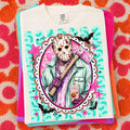 White graphic Jason-style tee with front face mask illustration and teal pink splash design