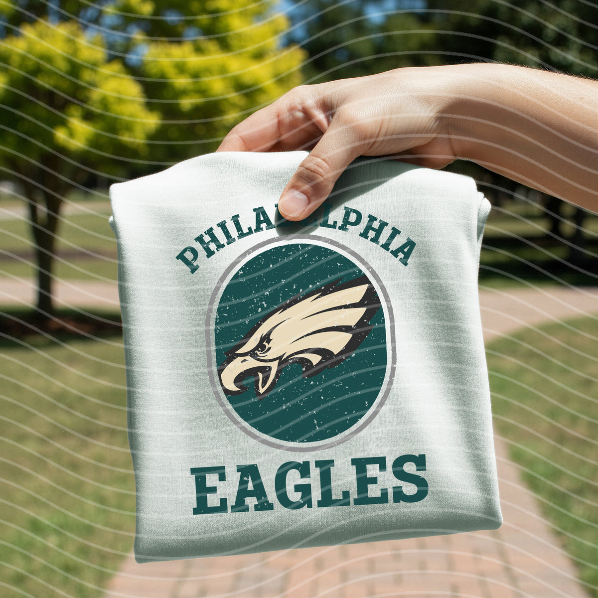 Light cream graphic tee with retro eagle stamp and PHILADELPHIA, EAGLES lettering