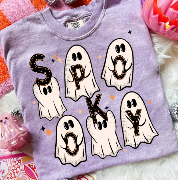 Lilac graphic T-shirt with cute white ghost faces and black spooky accents