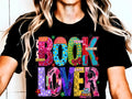 Black graphic tee with colorful 'BOOK LOVER' word art front