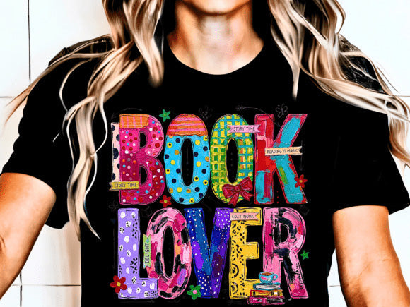 Black graphic tee with colorful 'BOOK LOVER' word art front