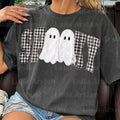 Dark gray graphic tee with two white ghost faces and black-and-white gingham panels