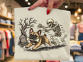Frenchy Skelly Bones graphic tee with tan dog, skull skeleton and RIP text