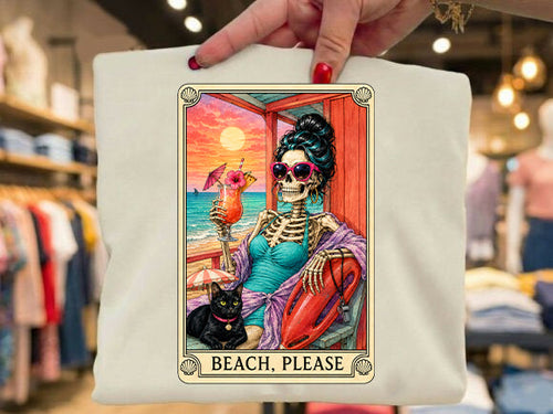 Graphic beach tee with colorful skull illustration and BEACH, PLEASE text