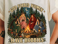 Off-white graphic tee with Have Hobbies slogan and illustrated campfire scene