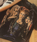 Ladies graphic tee with large front illustration of three women
