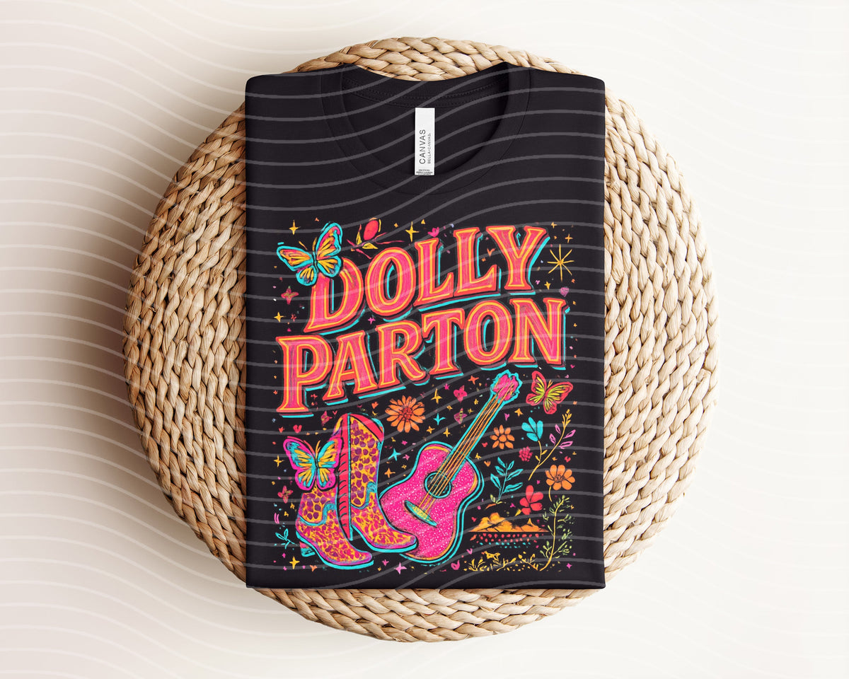 Black graphic tee with neon 'Dolly Parton' lettering and colorful cat artwork