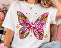 White butterfly graphic T-shirt with colorful jeweled wings and 'Dollie' script.
