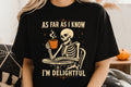 Black graphic tee with skeleton holding a pumpkin, text "AS FAR AS I KNOW" and "I'M DELIGHTFUL"