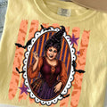 Light yellow crewneck graphic tee with framed witch portrait front print
