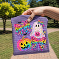 Purple graphic Halloween tee with holographic ghost, bows, jack-o'-lantern, stars