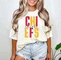 Cream graphic tee with red CH and yellow FFS text, crew neck