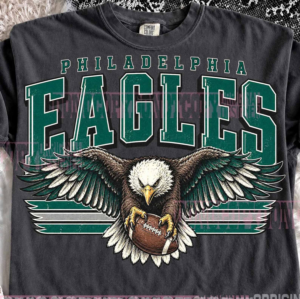Dark gray crewneck graphic tee with large eagle emblem and 'PHILADELPHIA EAGLES' text