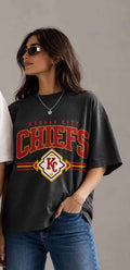 Dark charcoal Chiefs shield graphic tee with red and yellow logo on front