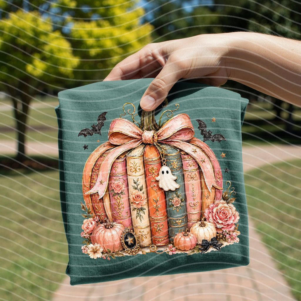 Teal crewneck graphic tee with large pumpkin illustration and bow