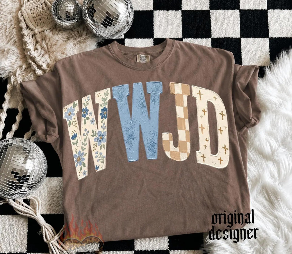 Brown graphic crewneck tee with WWJD letters, crosses, flowers, and original designer