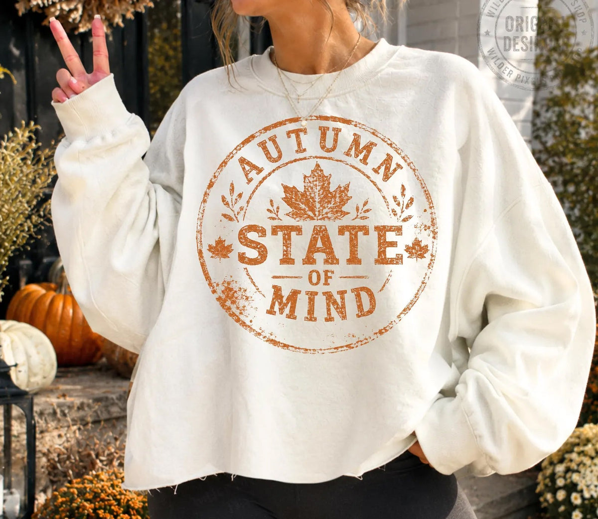 White long-sleeve graphic sweatshirt with Autumn State of Mind circular print