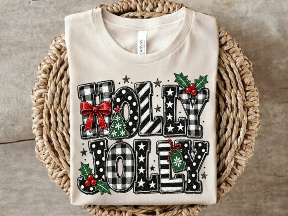 White graphic tee with festive holiday word print, stars, bow, and holly accents