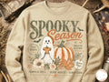 Cream graphic crewneck tee with Spooky Season ghost, pumpkin, flowers and text