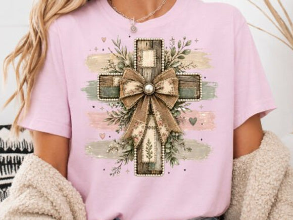 Lavender T-shirt with wooden cross graphic, ribbon bow and floral details