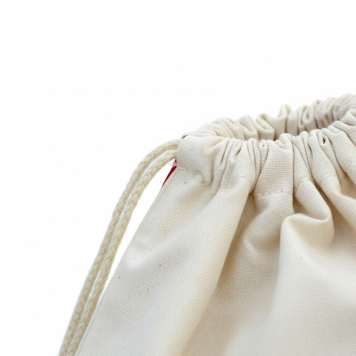 Cream canvas Santa bag top with gathered drawstring opening.