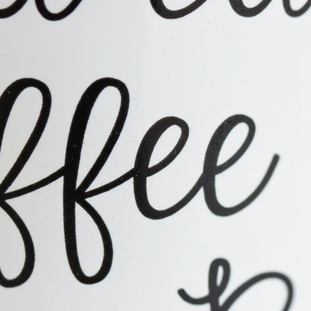 White ceramic coffee mug close-up showing black script 'my Bible'