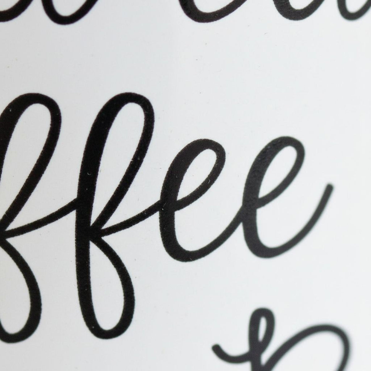 White ceramic coffee mug close-up showing black script 'my Bible'