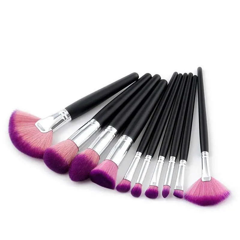 10-piece makeup brush set with black handles and purple gradient bristles