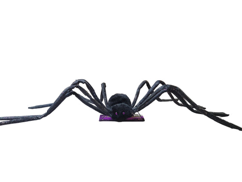Black glitter posable spider prop with purple eyes and spread legs