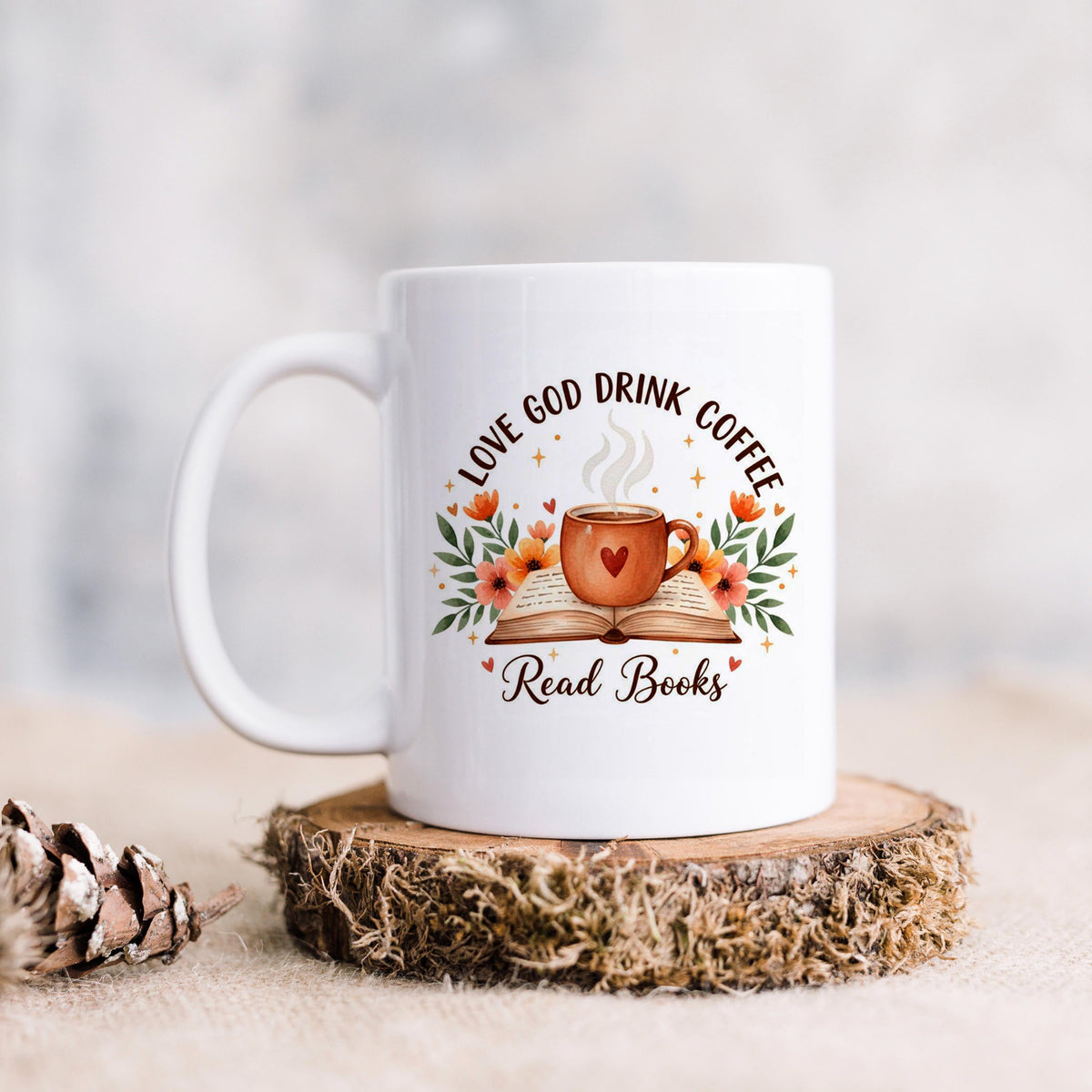 White coffee mug on rustic wood base with floral faith graphic and heart coffee cup
