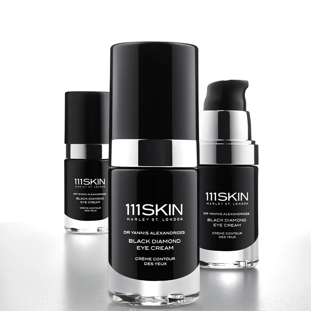 Set of Black Diamond eye cream bottles and jars with black caps and clear bases