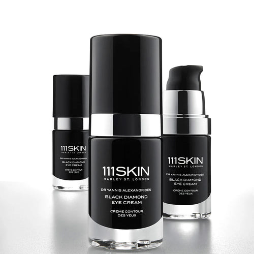 Set of Black Diamond eye cream bottles and jars with black caps and clear bases