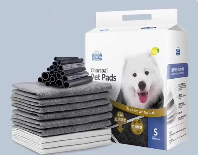 Charcoal pet training pads, dark gray folded stack with S-size box