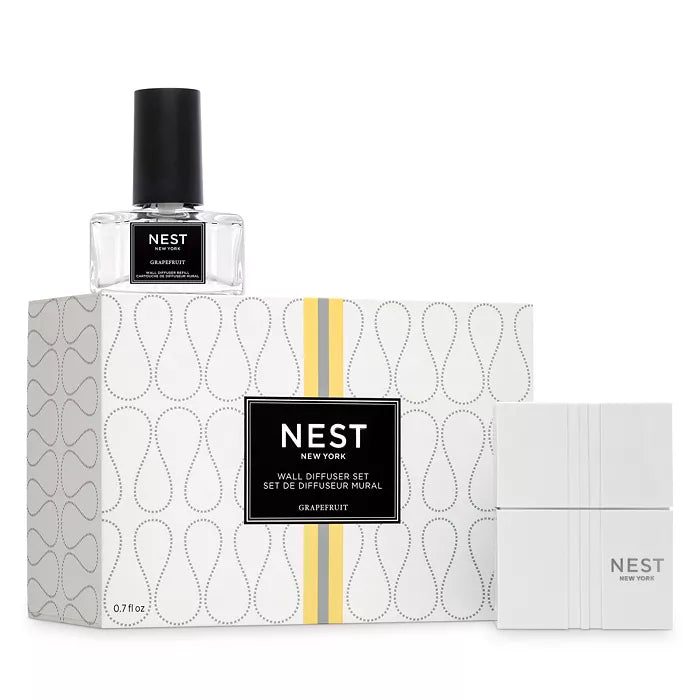 NEST wall diffuser set with grapefruit scent, clear bottle and patterned box packaging