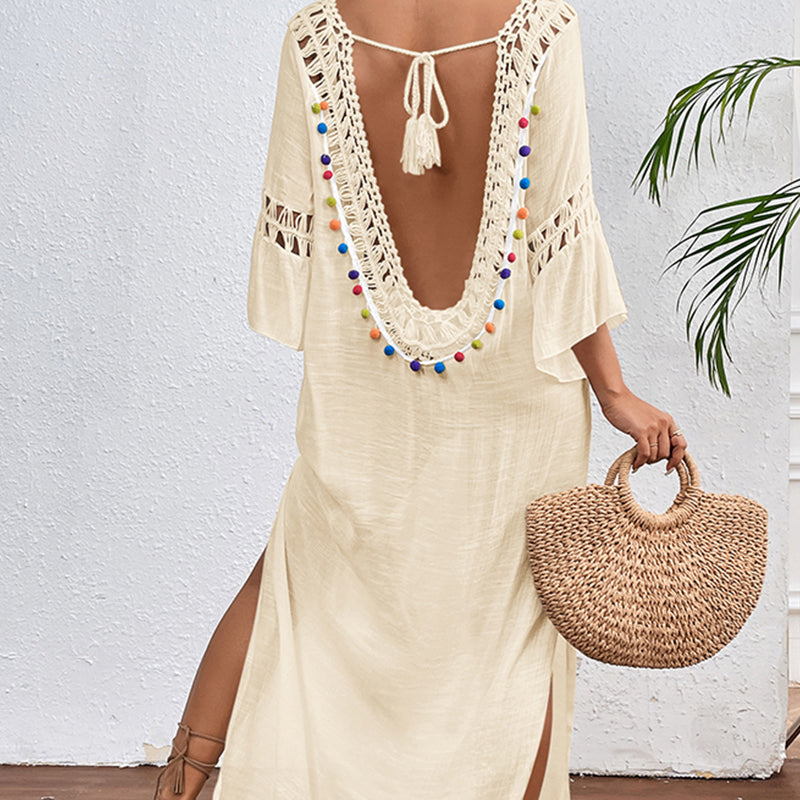 Cream long crochet beach cover-up dress with tassel-tie open back and pom trim