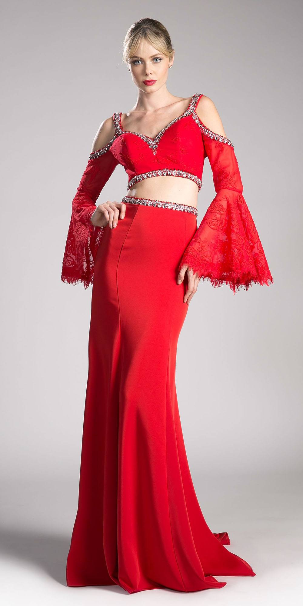 Red two-piece gown with cold-shoulder top and flared trumpet sleeves, fitted skirt