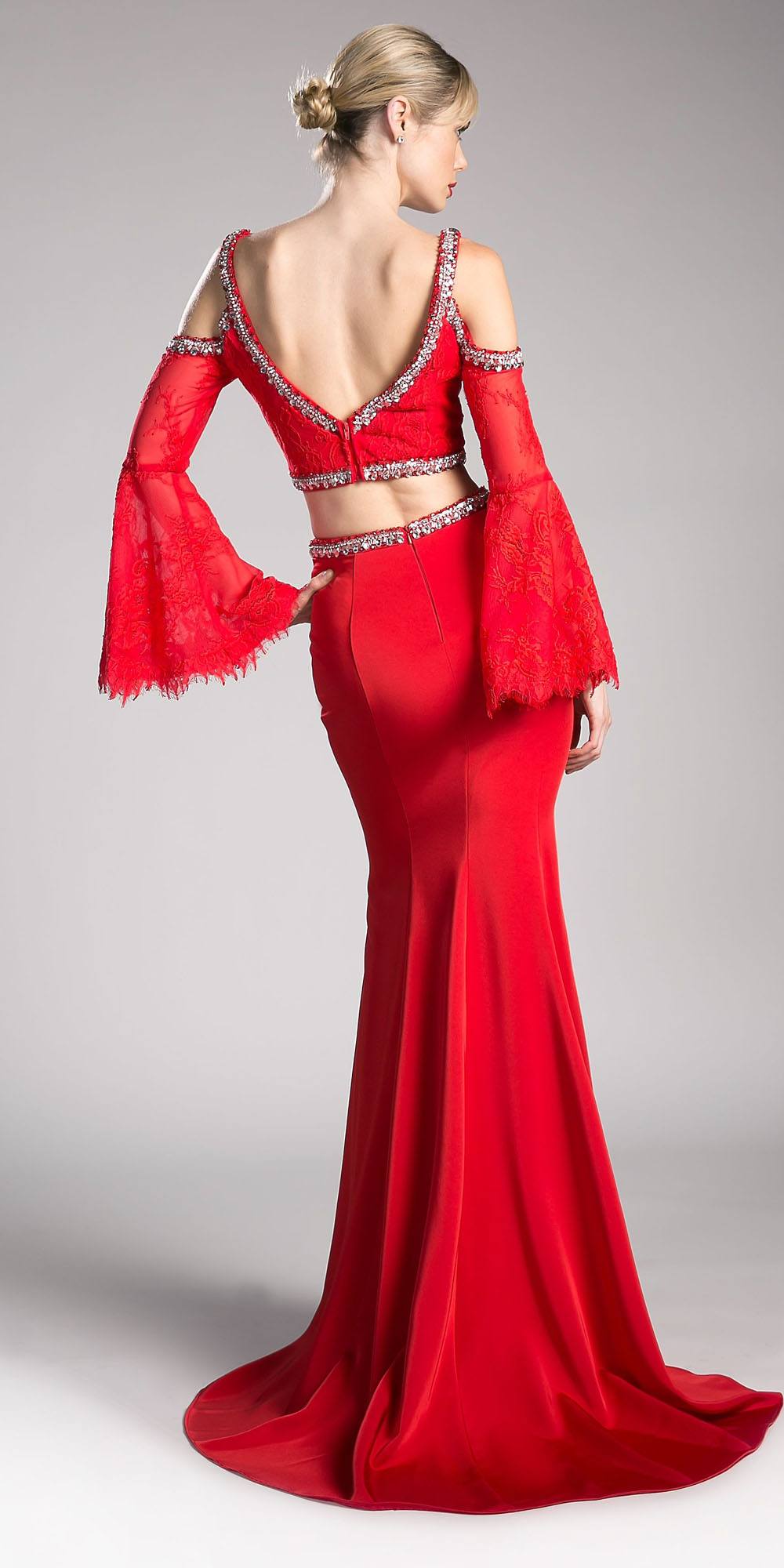 Red two-piece gown with cold-shoulder back and flared trumpet sleeves, fitted skirt