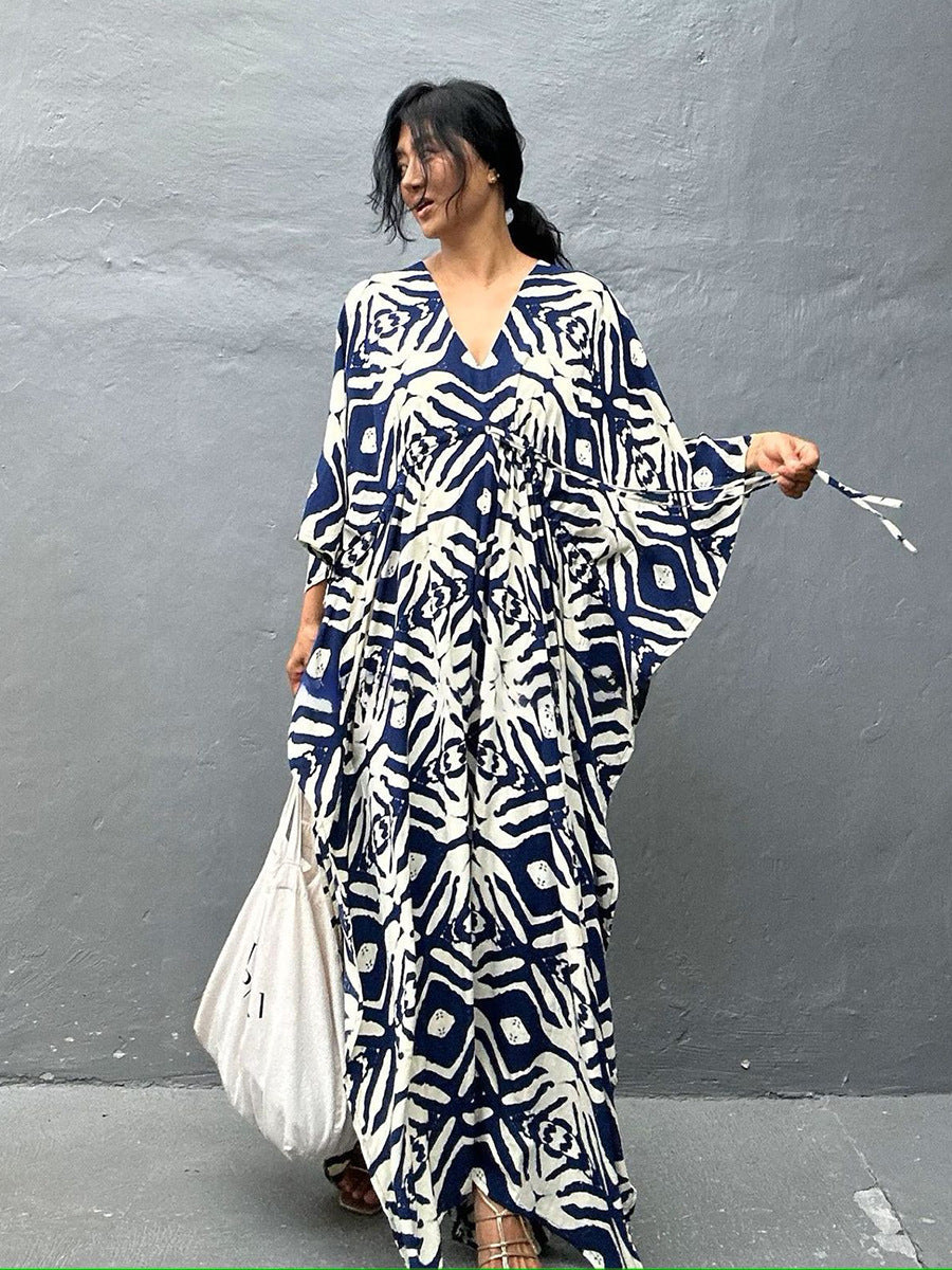 Navy and cream zebra-print rayon beach cover-up dress with V-neck and flowing wide sleeves