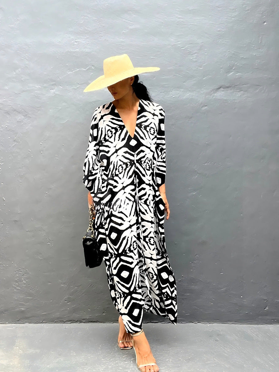 Black and white zebra-print rayon beach cover-up dress with V-neck and wide sleeves