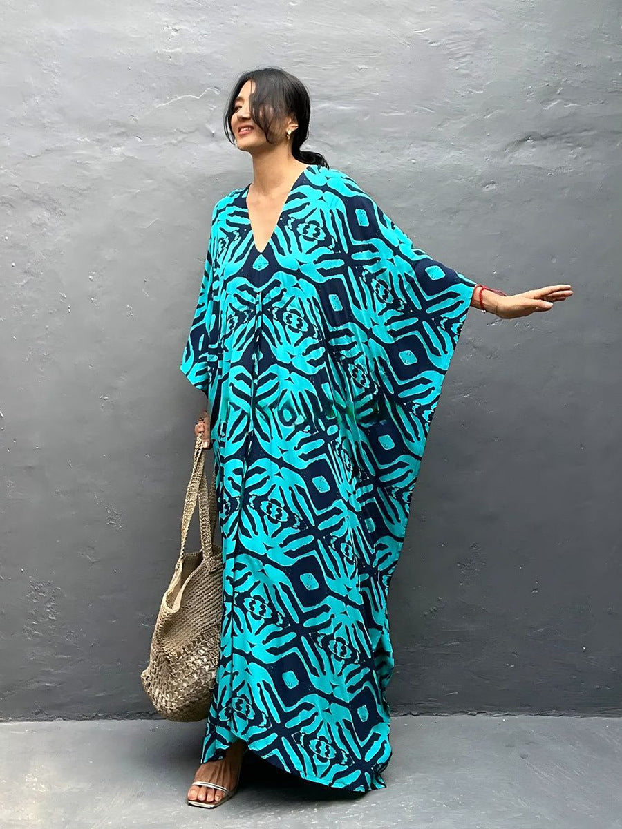 Blue zebra-print rayon beach cover-up dress with V-neck and loose, flowing silhouette