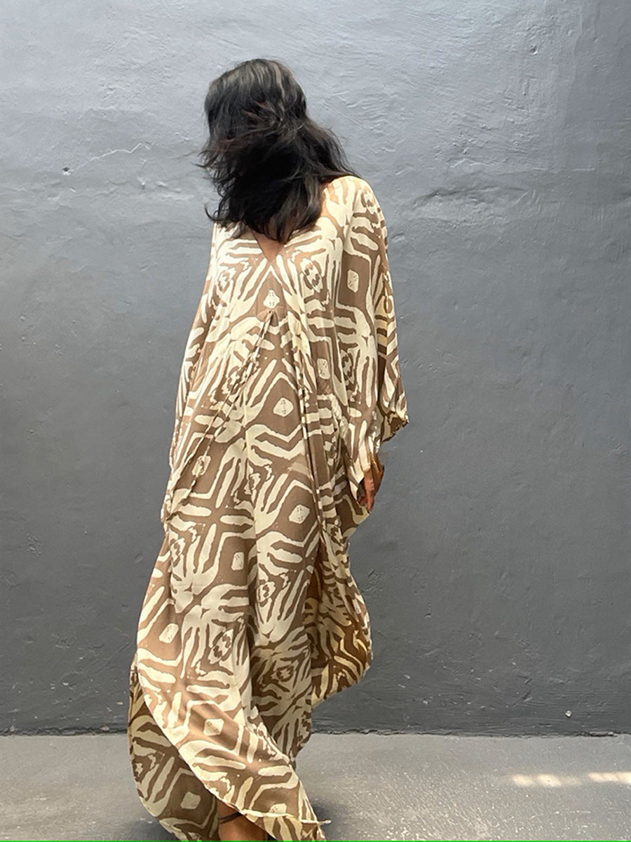 Beige and brown zebra-print rayon beach cover-up dress from the back, loose dolman sleeves