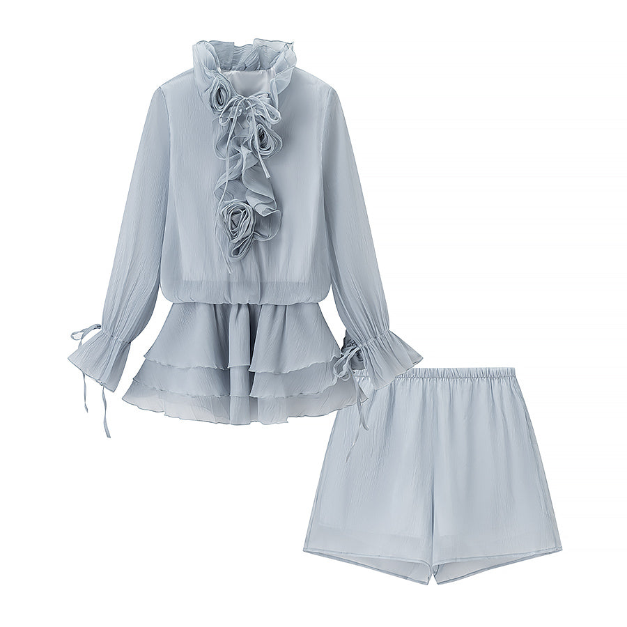Light blue ruffle long-sleeve blouse and matching shorts set with tie cuffs